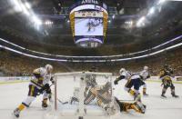 May 29, 2017; Pittsburgh, PA, USA; Nashville Predators center Vernon Fiddler (83) avoids a collision with Pittsburgh Penguins goalie Matt Murray (30) in game one of the 2017 Stanley Cup Final at PPG PAINTS Arena. Mandatory Credit: Don Wright-USA TODAY Sports