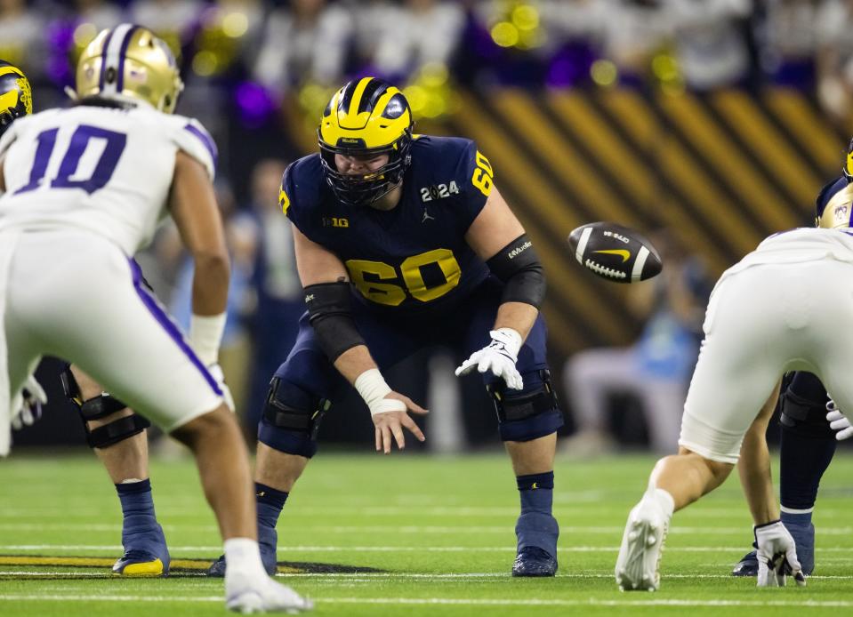 Jan 8, 2024; Houston, TX, USA; Michigan Wolverines offensive lineman Drake Nugent (60) against the Washington Huskies during the 2024 College Football Playoff national championship game at NRG Stadium. Mandatory Credit: Mark J. Rebilas-USA TODAY Sports