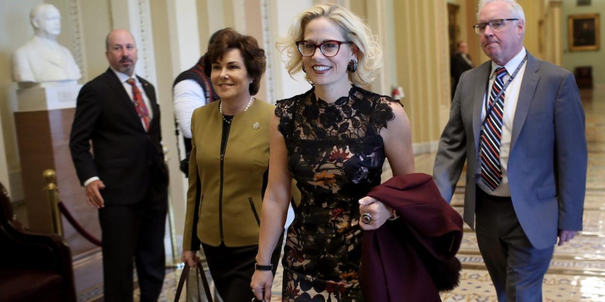 Democratic senators-elect Kyrsten Sinema (L) (D-AZ) and Jacky Rosen (R) (D-NV) walk to the office of Senate Minority Leader Chuck Schumer for a meeting at the U.S. Capitol November 13, 2018 in Washington, DC.