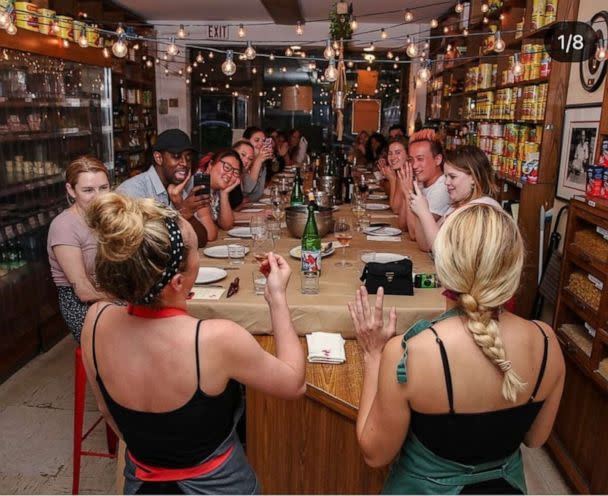 PHOTO: A table of diners inside Raffetto's pasta shop in New York City. (Petite Pasta Joint)