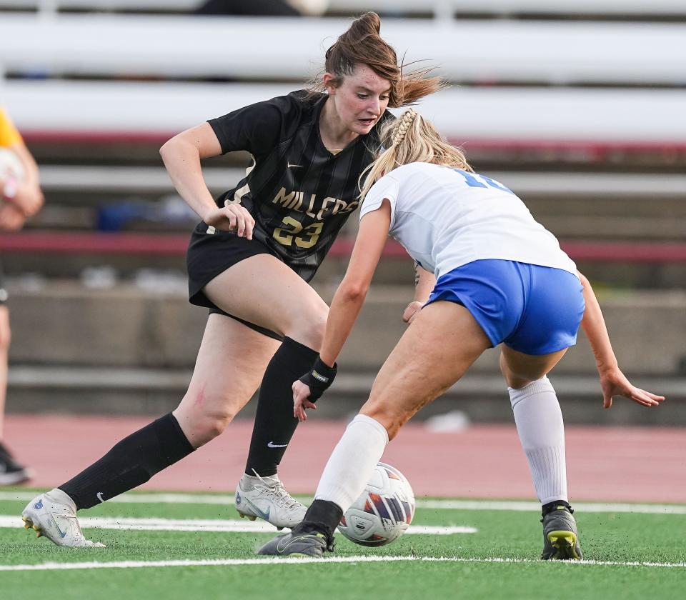 Noblesville Millers Meredith Tippner (23) pushes the ball up the field Saturday, Oct. 29, 2022, at Michael Carroll Track & Soccer Stadium in Indianapolis. The Noblesville Millers defeated the Carmel Greyhounds, 1-0, for the IHSAA Class 3A state Championship. 