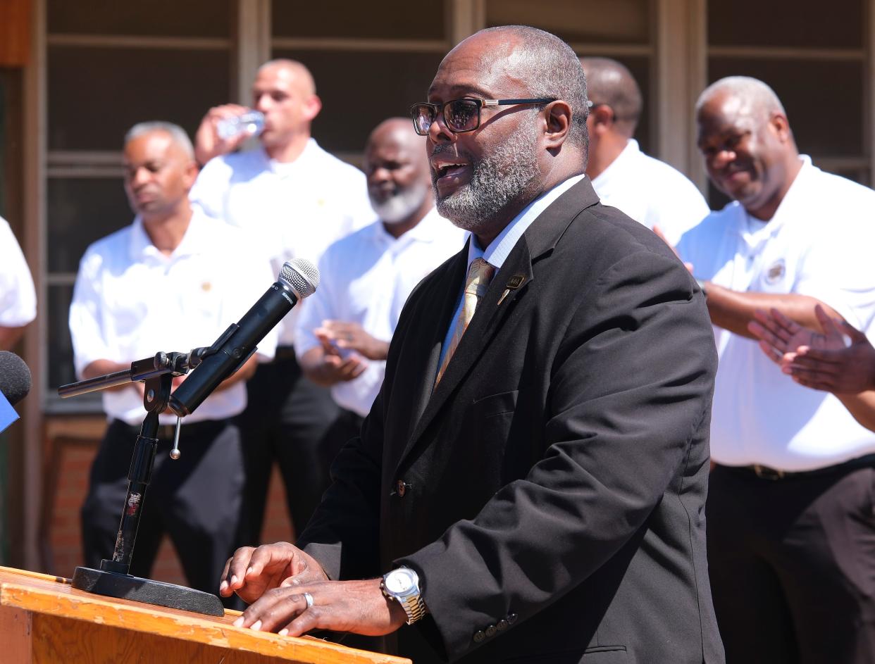 Tony Bryan, president of Alpha Phi Alpha Fraternity Inc. Beta Eta Lambda Chapter, speaks on Friday at the grand opening of the Garden Oaks Community Center.