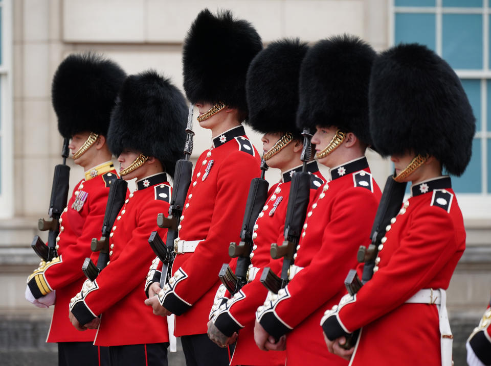 <p>Members of the 1st Battalion the Coldstream Guards take part in the Changing of the Guard, in the forecourt of Buckingham Palace, London, which is taking place for the first time since the start of the coronavirus pandemic. Picture date: Monday August 23, 2021.</p>
