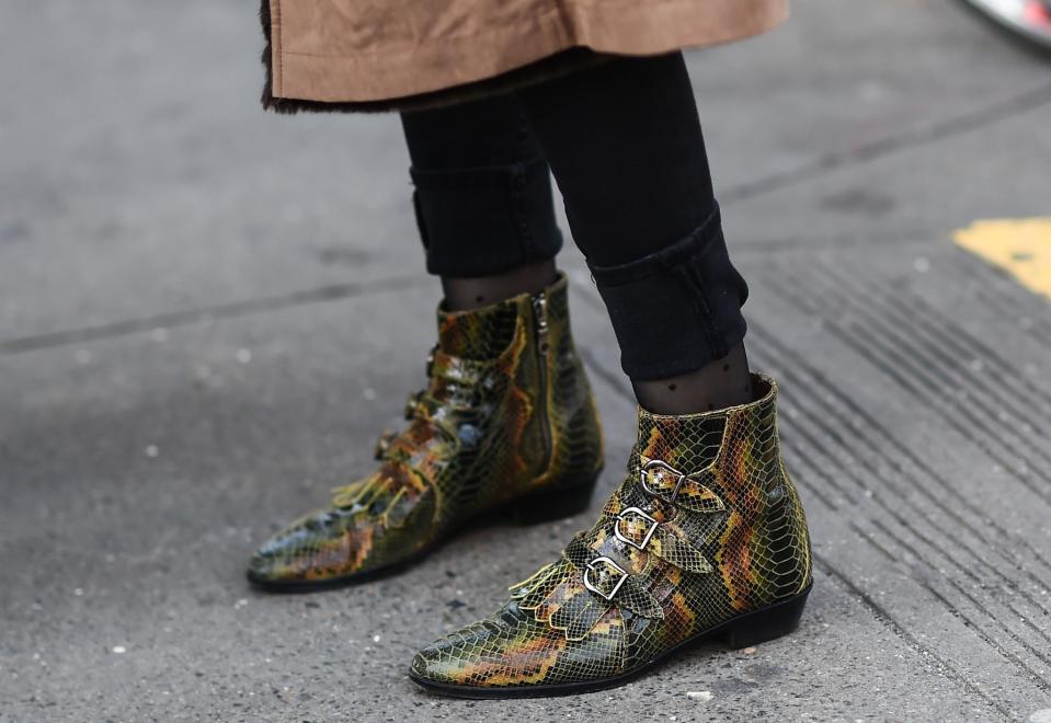 Snakeskin booties spotted at New York Fashion Week.
