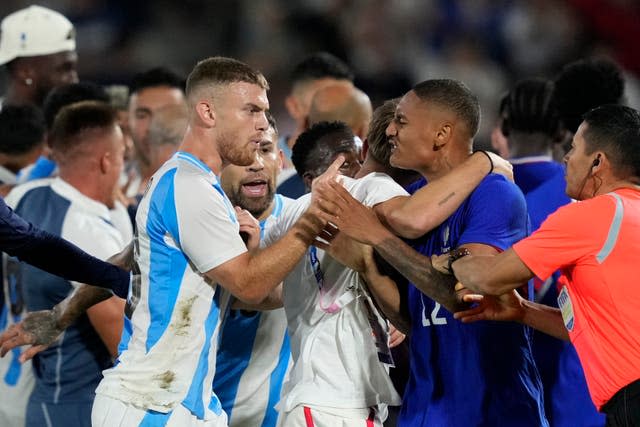 France and Argentina players square up at the end of their match