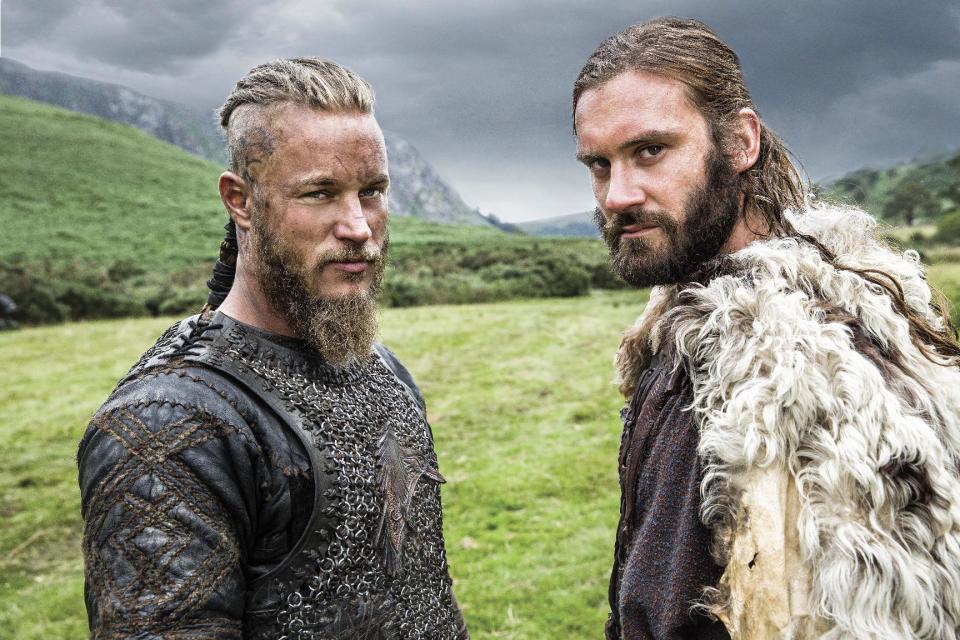 In this photo dated Aug. 28 2013 Brothers Ragnar, left, and Rollo, right, leading characters from television show Vikings, History’s brooding and brutal drama about the 8th-century Nordic warrior Ragnar Lothbrok. After a six-month shoot in Ireland, season two debuts Thursday night sporting a bigger scale, more confident pace and stronger entertainment than last year’s uneven, at-times plodding inaugural run.(AP Photo/Jonathan Hession/History)