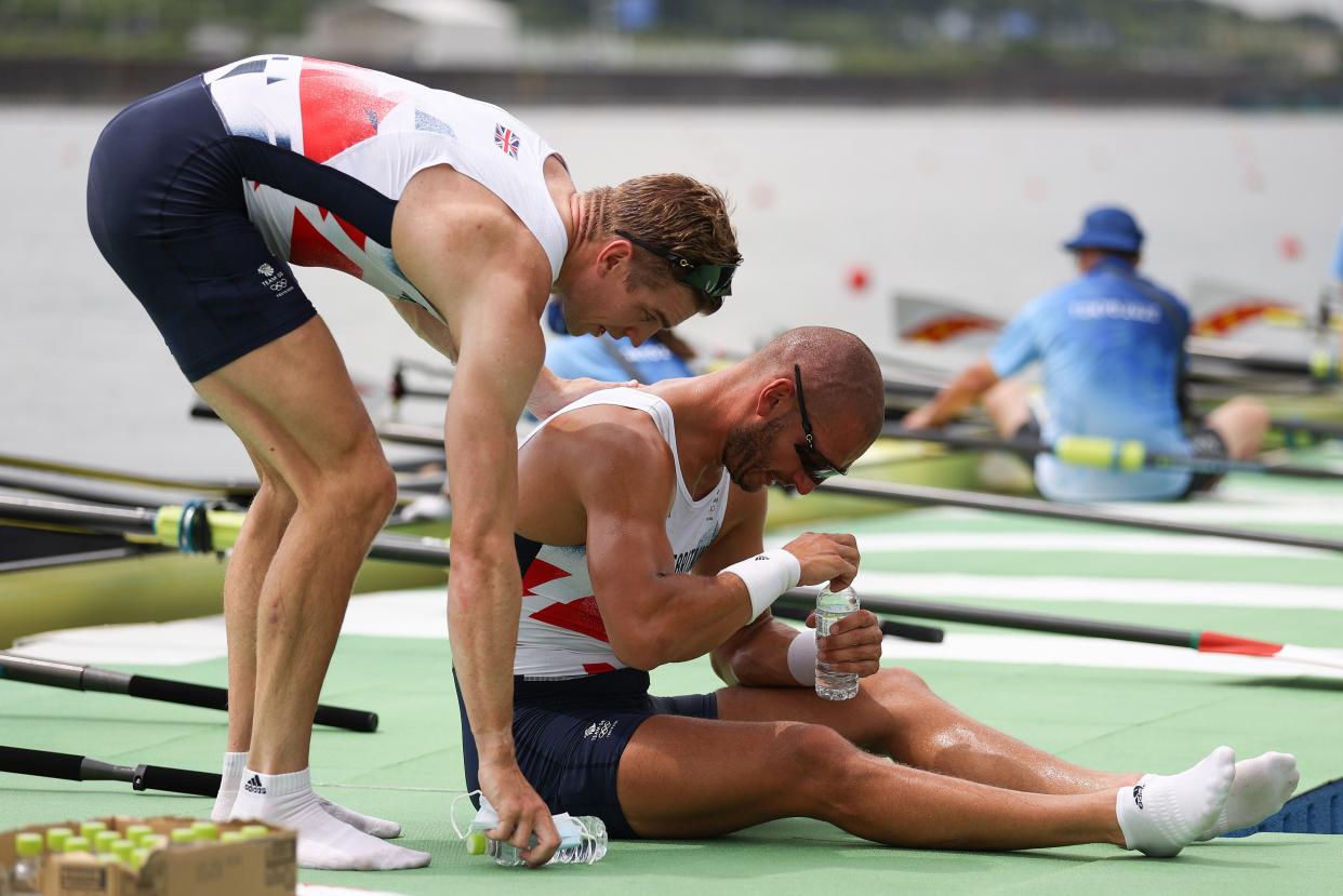 Dejected: Mohamed Sibhi is comforted (Getty Images)