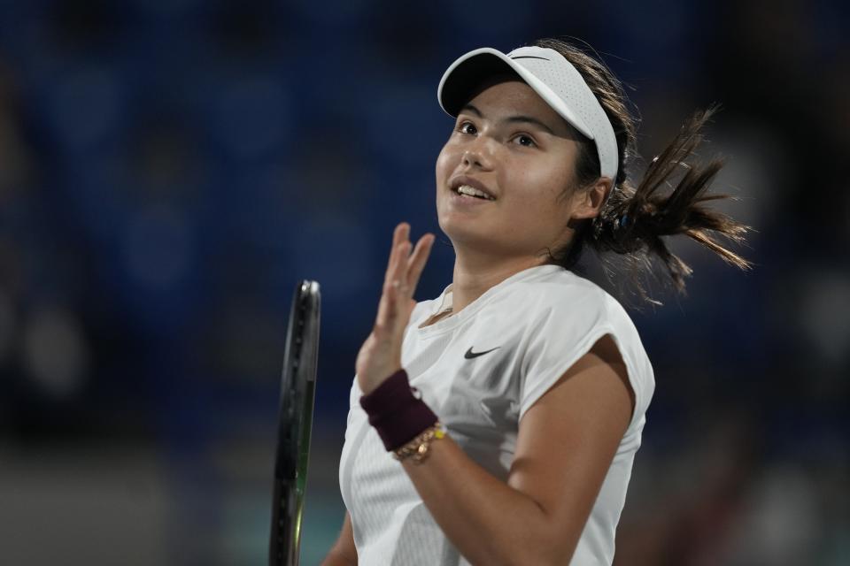 Emma Raducanu of Britain, reacts against Ons Jabeur of Tunisia, during a match of the Mubadala World Tennis Championship in Abu Dhabi, United Arab Emirates, Friday, Dec. 16, 2022. (AP Photo/Kamran Jebreili)