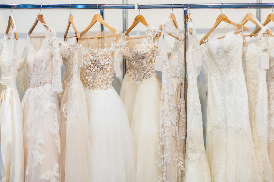 Bridal dresses hanging on a rack