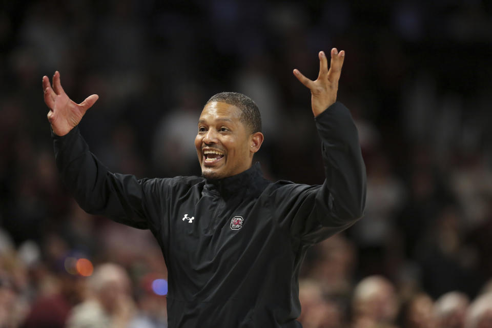 FILE - South Carolina head coach Lamont Paris throws his hands up in disbelief during the second half of an NCAA college basketball game against LSU Saturday, Feb. 17, 2024, in Columbia, S.C. Lamont Paris is the AP All-SEC coach of the year in voting released Tuesday, March 12, 2024.(AP Photo/Artie Walker Jr.)