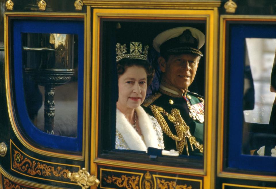 <div class="inline-image__caption"><p>Queen Elizabeth II and Prince Philip ride in the royal carriage to the wedding of their son Prince Andrew to Sarah Ferguson on July 23, 1986.</p></div> <div class="inline-image__credit">Derek Hudson/Getty</div>