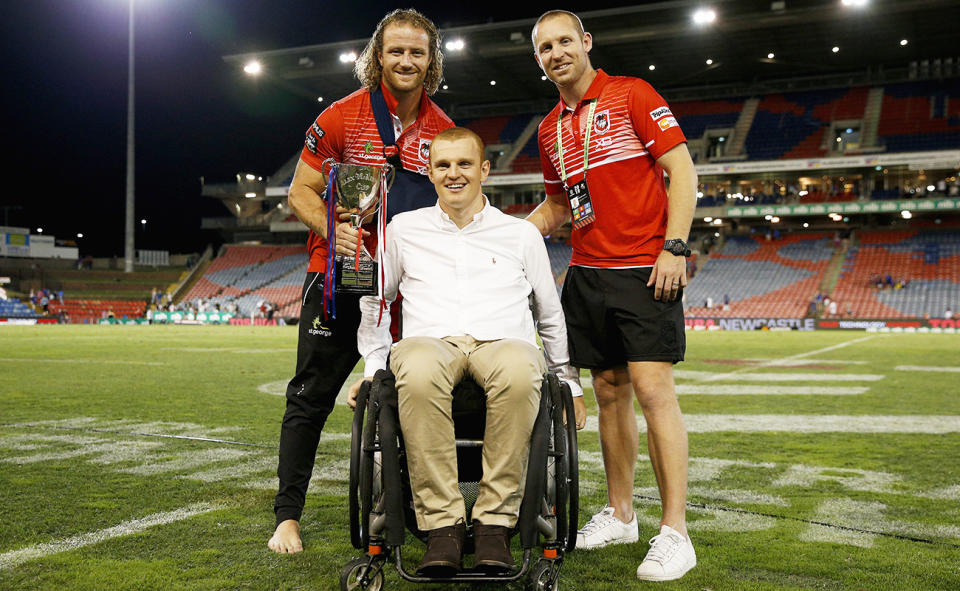 Alex McKinnon, pictured here with Korbin Sims and Ben Hornby of the Dragons in 2019.