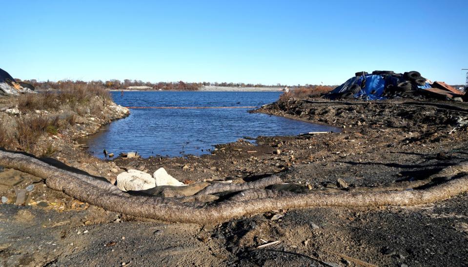 Rhode Island Recycled Metals, on Allens Avenue in Providence, has been a headache for environmental regulators for years. But progress is slowly being made to clean it up, most noticeably with the removal of three junk vessels off its shore.