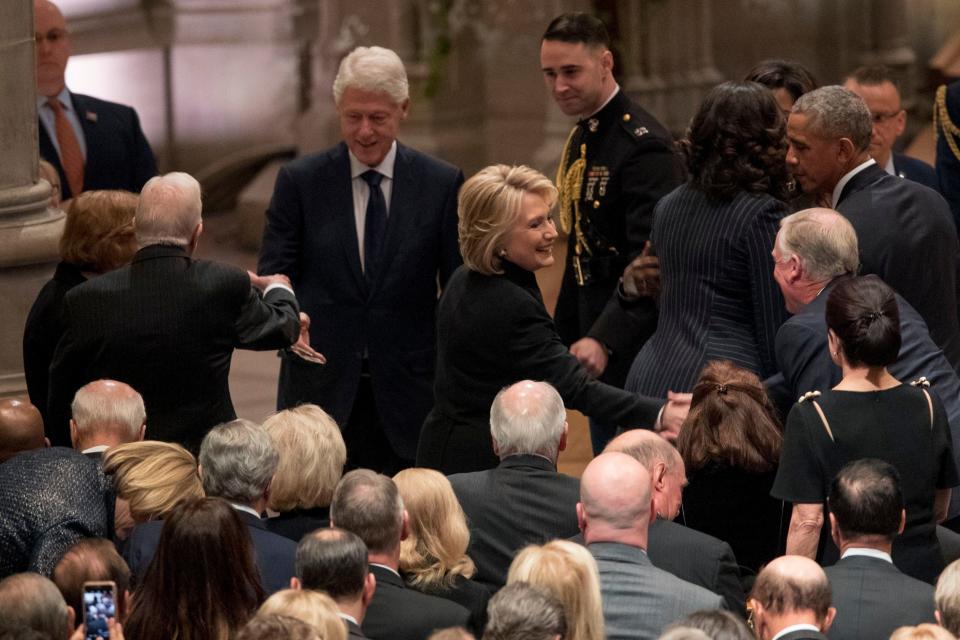 Former President Jimmy Carter, and former first lady Rosalynn Carter, greet former President Bill Clinton, as his wife, former Secretary of State Hillary Clinton, greets a guest before a State Funeral for former President George H.W. Bush at the National Cathedral, in Washington, DC on Dec. 5, 2018.