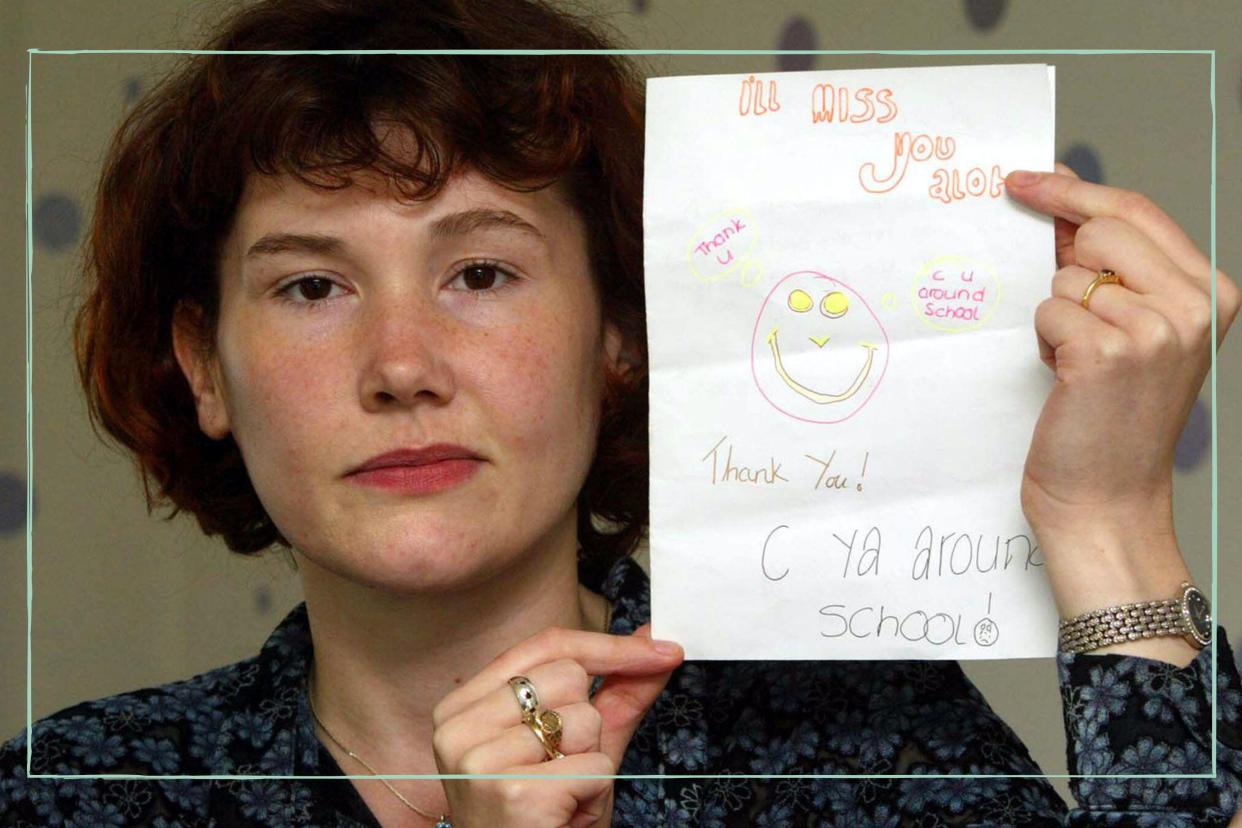  Maxine Carr holding a card made for her by Holly Wells. 