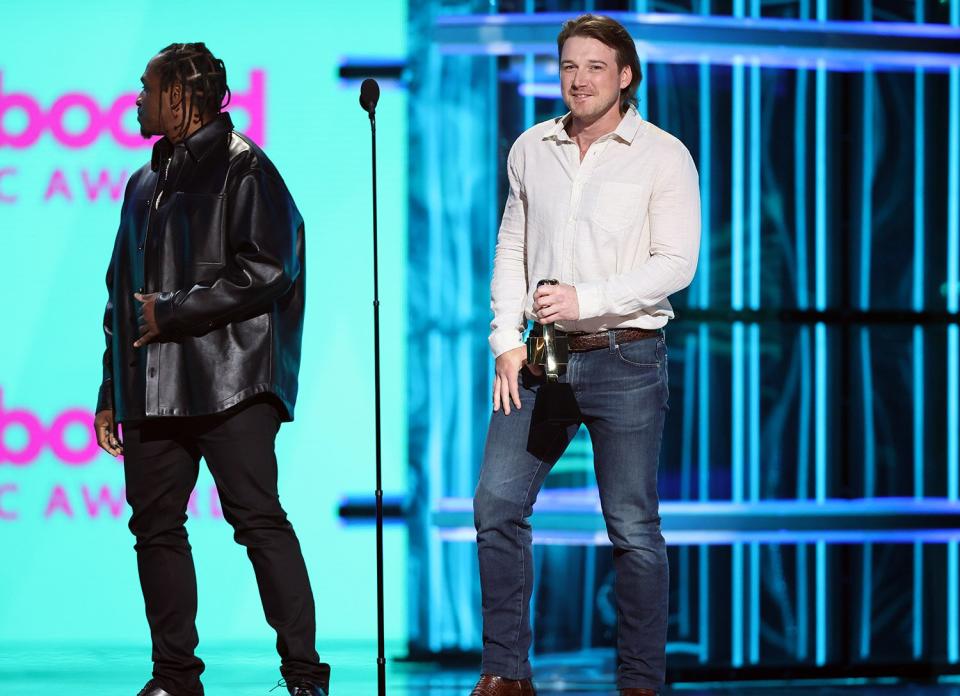 LAS VEGAS, NV - May 15: 2022 BILLBOARD MUSIC AWARDS -- Pictured: (l-r) Pusha T and Morgan Wallen on stage during the 2022 Billboard Music Awards held at the MGM Grand Garden Arena on May 15, 2022. -- (Photo by Rich Polk/NBCU Photo Bank via Getty Images)