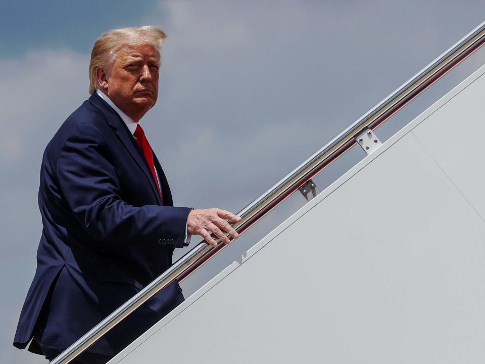 President Trump boards Air Force One as he departs Washington to travel to Atlanta, Georgia at Joint Base Andrews, Maryland on 15 July: REUTERS/Jonathan Ernst