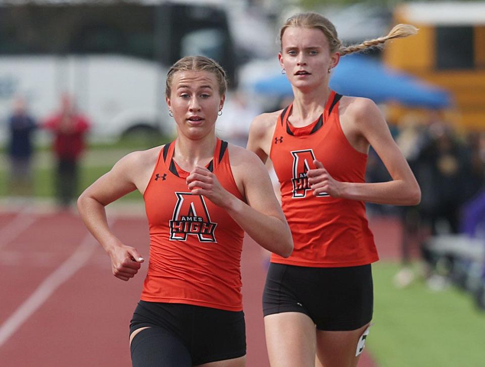 Ames juniors Marley Turk (front) and Lauren Risdal both qualified for state in the 3,000 and 1,500-meter running events