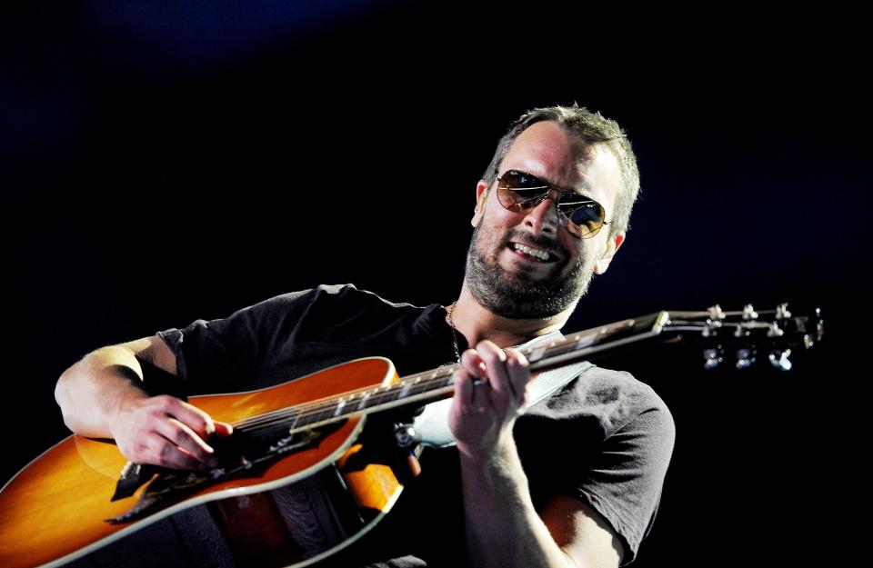 Eric Church is performing for the packed audience during the CMA Music Festival at LP Field June 6, 2014.