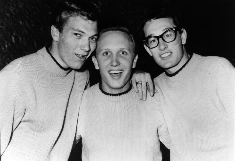 Rock ‘n’ roll singer, songwriter and guitarist Buddy Holly (1936 – 1959), right, with his group The Crickets, Jerry Allison and Joe Mauldin.