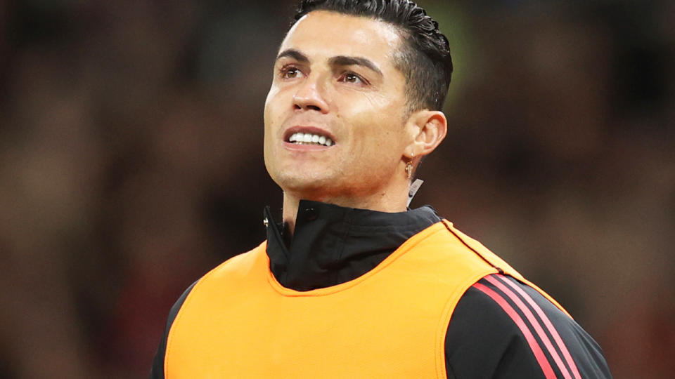 Christiano Ronaldo is pictured warming up for Manchester United.