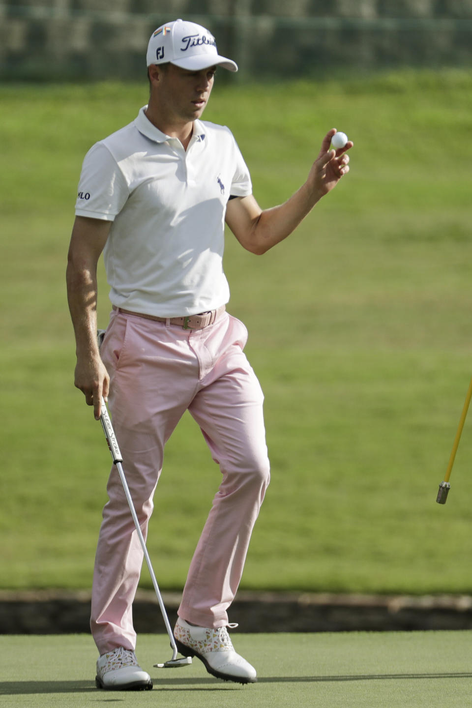 Justin Thomas waves on the 18th hole during the final round of the World Golf Championship-FedEx St. Jude Invitational Sunday, Aug. 2, 2020, in Memphis, Tenn. (AP Photo/Mark Humphrey)