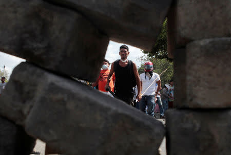 Demonstrators take part in a protest over a controversial reform to the pension plans of the Nicaraguan Social Security Institute (INSS) in Managua, Nicaragua April 21, 2018. REUTERS/Oswaldo Rivas