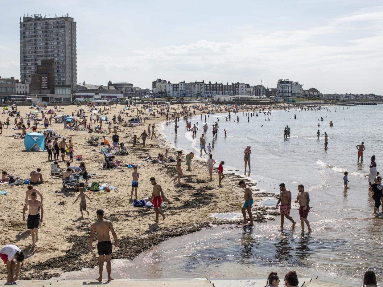 Members of the public relax on the beach on May 26, 2020 in Margate, England: Getty Images