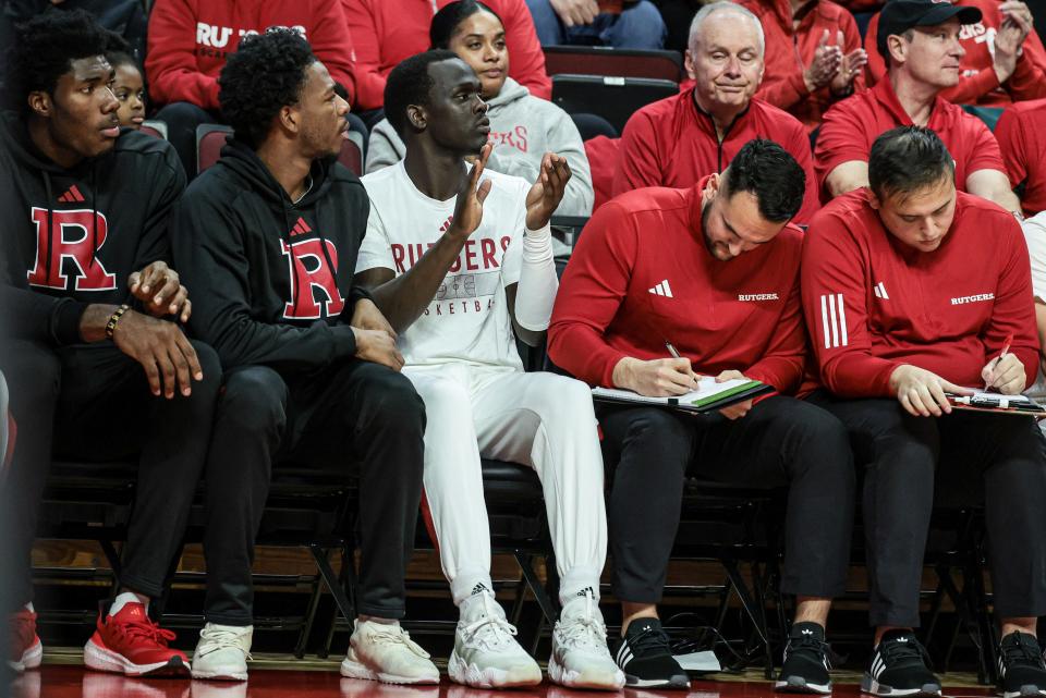 Nov 10, 2023; Piscataway, New Jersey, USA; Rutgers Scarlet Knights forward Mawot Mag (center) looks on during the first half against the Boston University Terriers at Jersey Mike's Arena. Mandatory Credit: Vincent Carchietta-USA TODAY Sports