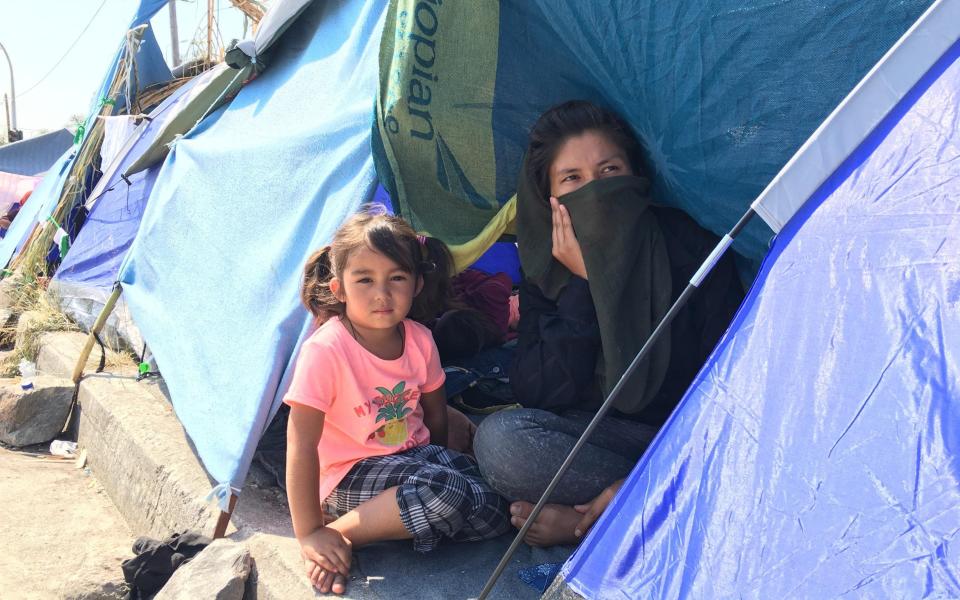 A mother and child in the refugee camp where Florence fled after the Lesbos fire - Sofia Barbarani