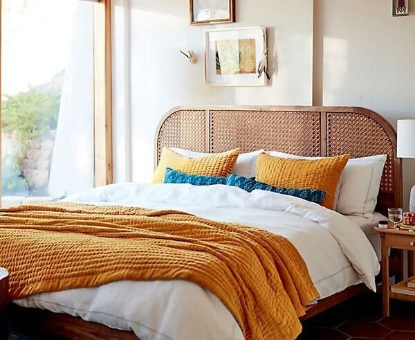 Ochre-colored bedding is a great way to bring this trend to your home.&nbsp; (Photo: Anthropologie)