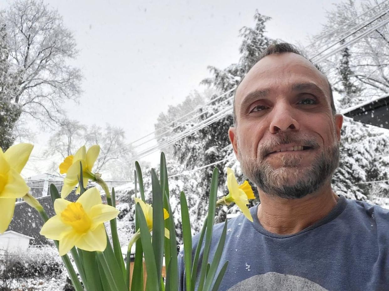 John Zeus Tokatlidis was diagnosed with Stage 4 non-Hodgkin's lymphoma in early 2019. He credits the Canadian Cancer Society's investments in research and support programs with helping him through his cancer journey (Submitted by John Zeus Tokatlidis - image credit)