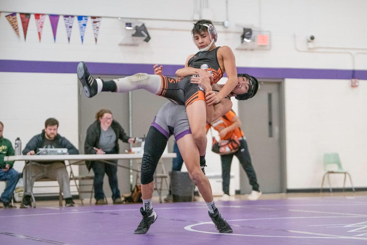 Rye High School's Andy Prichard prepares to slam La Junta's Joseph Gamez during a dual on Thursday, Jan. 5, 2023.