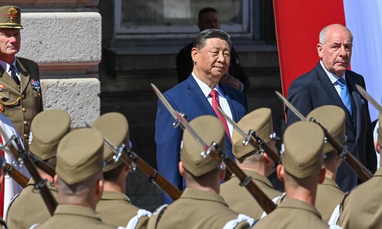 <span>The Hungarian president, Tamás Sulyok, receiving the Chinese president, Xi Jinping, with military honours at Buda Castle on Thursday.</span><span>Photograph: Zoltán Máthé/AP</span>