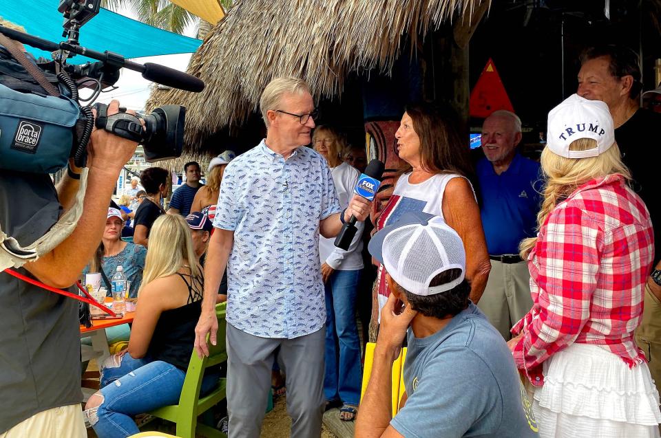 Steve Doocy of Fox & Friends speaks to those who attended the show at Tiki 52 in Tequesta om Friday.