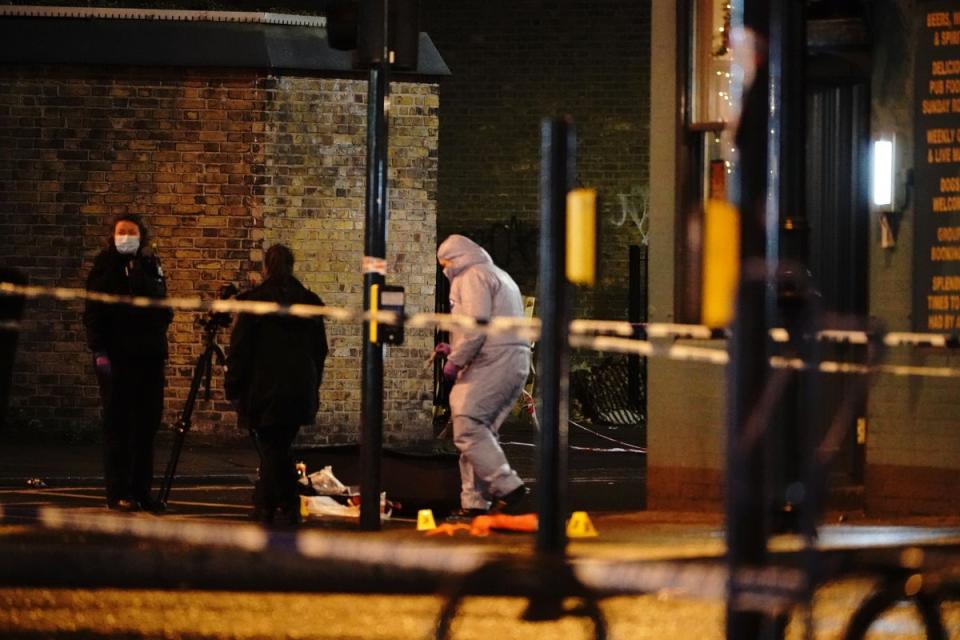 Police at the scene of the Clapham shooting (Aaron Chown/PA Wire)