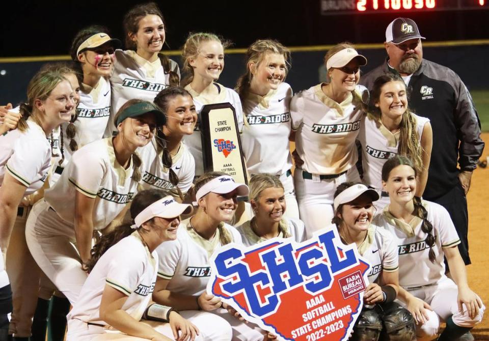 The Catawba Ridge softball team poses for a picture following their title-clinching 10-7 win over South Florence. Head coach Michael Kidd (black, grey sweatshirt; far right) said that the moment means a lot after seeing his players grow from seventh- and eighth-graders to state champions Justin Driggers