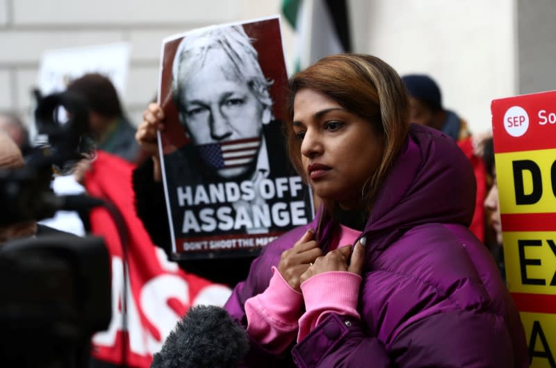 Supporters of WikiLeaks' founder Julian Assange gather outside Westminster Magistrates Court in London