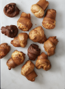 <p>These fun pastries puff to impressive heights in the oven, be sure to serve them right away.</p><p><em><a href="https://www.goodhousekeeping.com/food-recipes/easy/a35296/classic-popovers/" rel="nofollow noopener" target="_blank" data-ylk="slk:Get the recipe for Classic Popovers »;elm:context_link;itc:0;sec:content-canvas" class="link ">Get the recipe for Classic Popovers »</a></em></p>