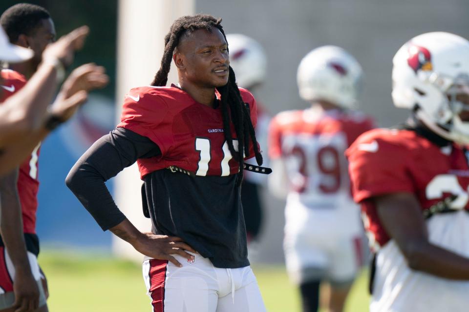 Aug 24, 2022; Nashville, Tennessee;  Arizona Cardinals wide receiver DeAndre Hopkins (10) watches his teammates run a drill during a joint training camp practice against the Tennessee Titans at Ascension Saint Thomas Sports Park.