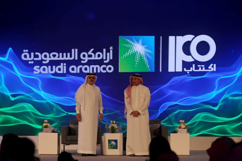 Yasser al-Rumayyan, Saudi Aramco's chairman, and Amin H. Nasser, president and CEO of Aramco, attend a news conference in Dhahran