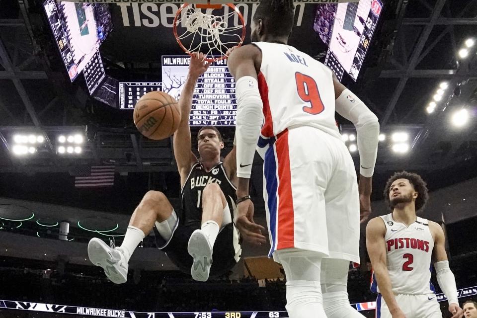 Milwaukee Bucks' Brook Lopez dunks during the second half of an NBA basketball game against the Detroit Pistons Monday, Oct. 31, 2022, in Milwaukee. The Bucks won 110-108. (AP Photo/Morry Gash)