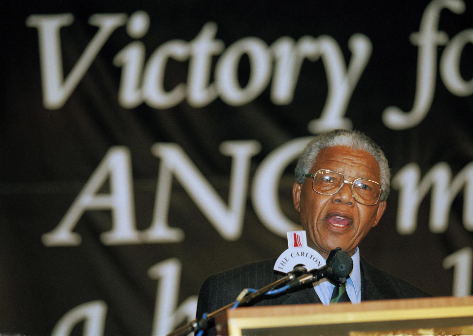 FILE — Nelson Mandela addresses supporters during victory celebrations in Johannesburg as he and the African National Congress are set to take power following the country's first racially integrated election, May 2, 1994. South Africans celebrate "Freedom Day" every April 27, when they remember their country's pivotal first democratic elections in 1994 that announced the official end of the racial segregation and oppression of apartheid. (AP Photo/John Parkin)