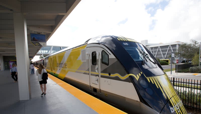 In this Jan. 11, 2018, file photo, a Brightline train sits at the station in Fort Lauderdale, Fla. Virgin Trains USA, which runs the Brightline train, is planning a high-speed train between Las Vegas and Southern California.