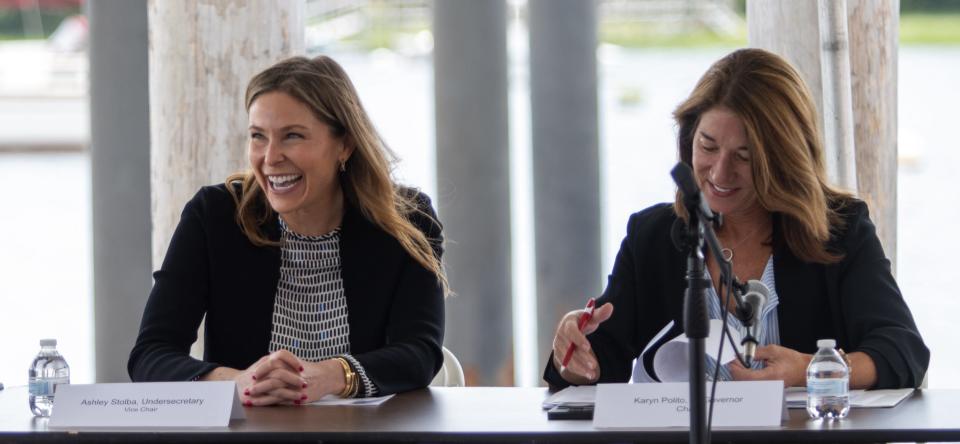 Undersecretary of the Executive Office of Housing and Economic Development Ashely Stolba, left, and Lt. Gov. Karyn Polito share a laugh at the Seaport Economic Council meeting Tuesday afternoon at Stage Harbor in Chatham.