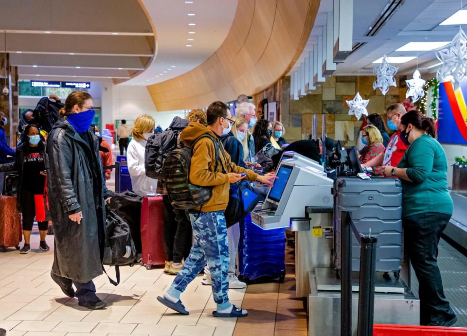 Travelers check in for their flights at Will Rogers World Airport in Oklahoma City.