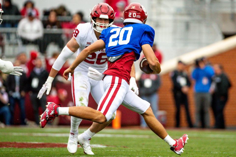 Oklahoma Red Team's Jacob Switzer (20) runs the ball during a spring scrimmage game at Gaylord Family Oklahoma Memorial Stadium in Norman Okla., on Saturday, April 22, 2023.