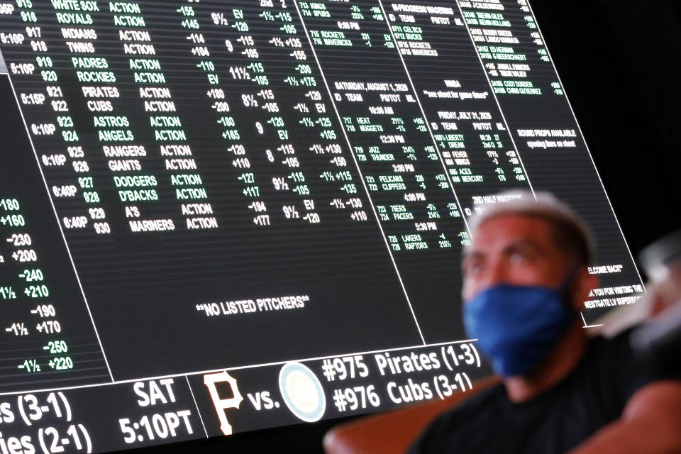 Sports betting is increasingly becoming legalized in states across the U.S. (AP Photo/John Locher)