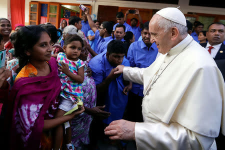 Pope Francis meets with sick people and staff of the Mother Teresa House in the Dhaka's Tejgaon neighborhood, Bangladesh, December 2, 2017. REUTERS/Andrew Medichini/Pool