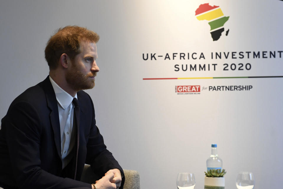 Britain's Prince Harry meets with Prime Minister of Morocco Saadeddine Othmani at the UK Africa Investment Summit in London, Monday Jan. 20, 2020. Britain's Prime Minister Boris Johnson is hosting 54 African heads of state or government in London, as the U.K. prepares for post-Brexit dealings with the world. (Stefan Rousseau/Pool via AP)